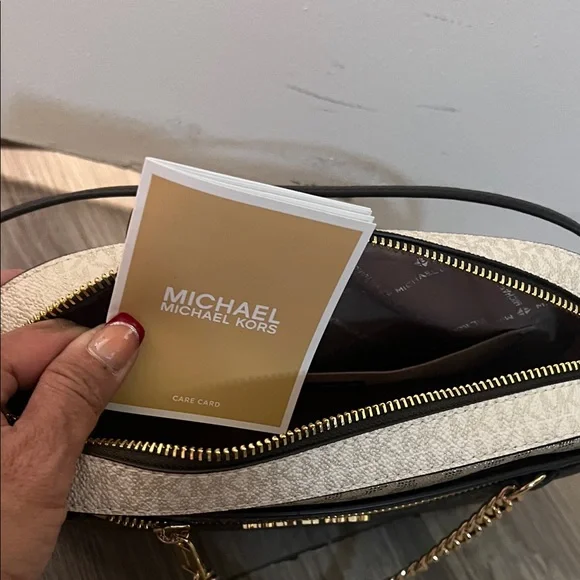 Michael Kors Black and Tan Crossbody Bag with Gold Accents - Picture 4 of 5